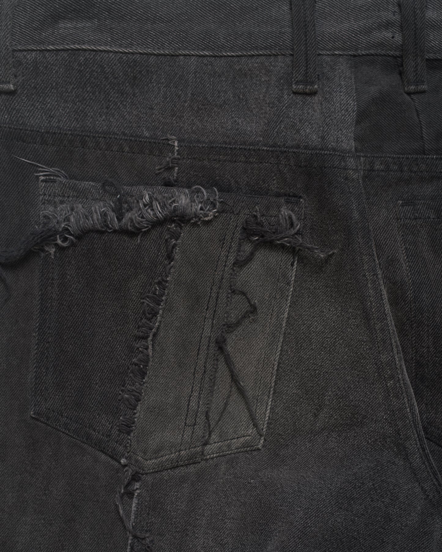 WORN BLACK SCRAP DENIM